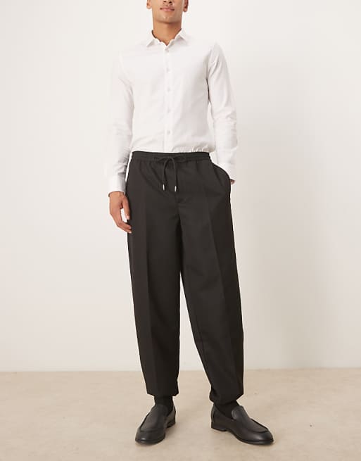 DESIGN Tapered Fit Trouser With Elasticated Waist And Cuffs In Black