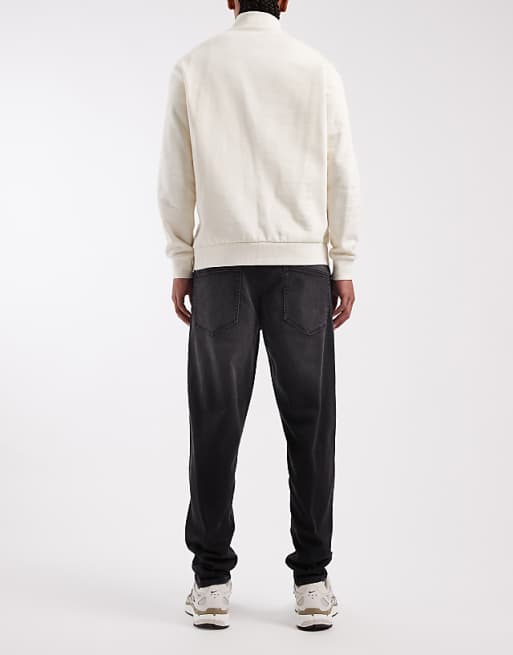 DESIGN Tapered Jeans In Black Wash With Stretch
