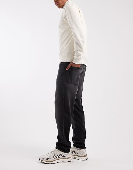 DESIGN Tapered Jeans In Black Wash With Stretch