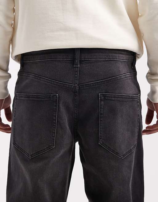 DESIGN Tapered Jeans In Black Wash With Stretch