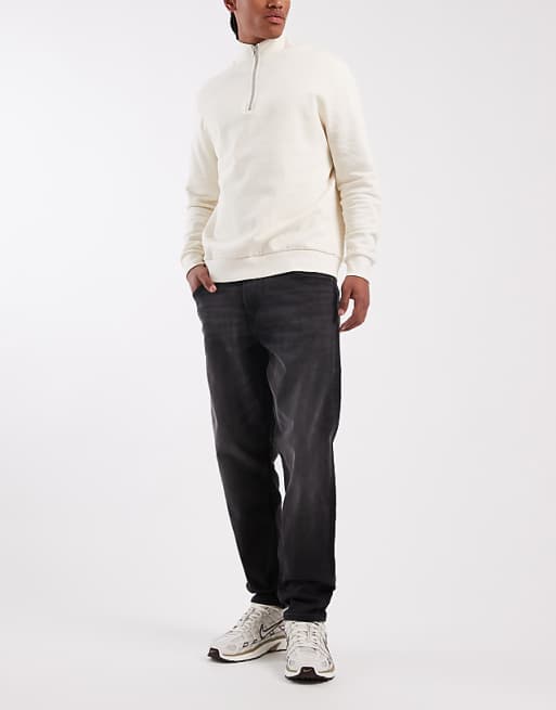 DESIGN tapered jeans in black wash with stretch