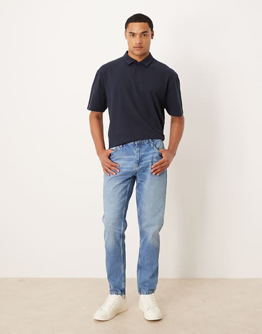 DESIGN tapered jeans in light wash