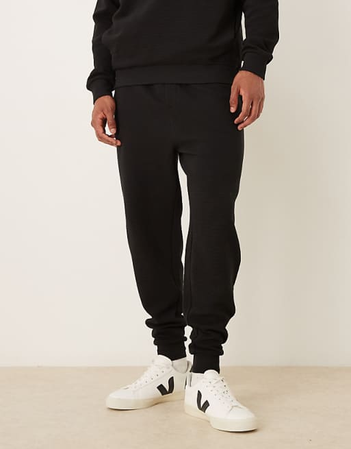 DESIGN tapered jogger co-ord with ribbed cuff in black