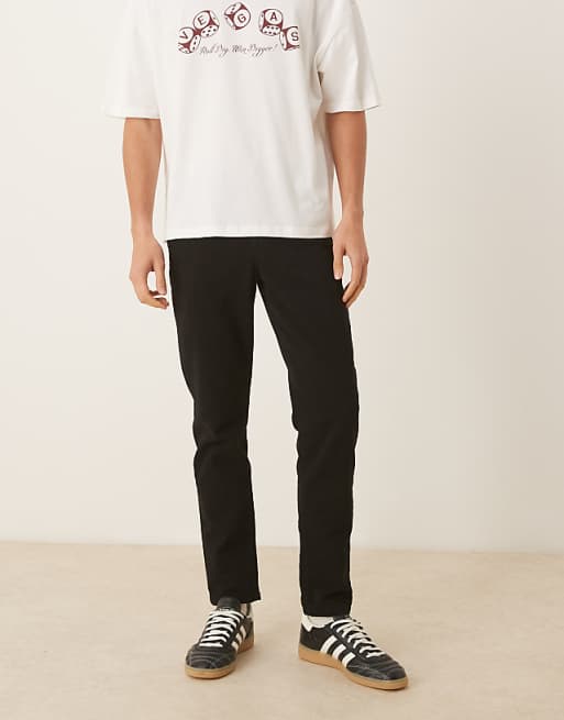 DESIGN tapered trousers in black