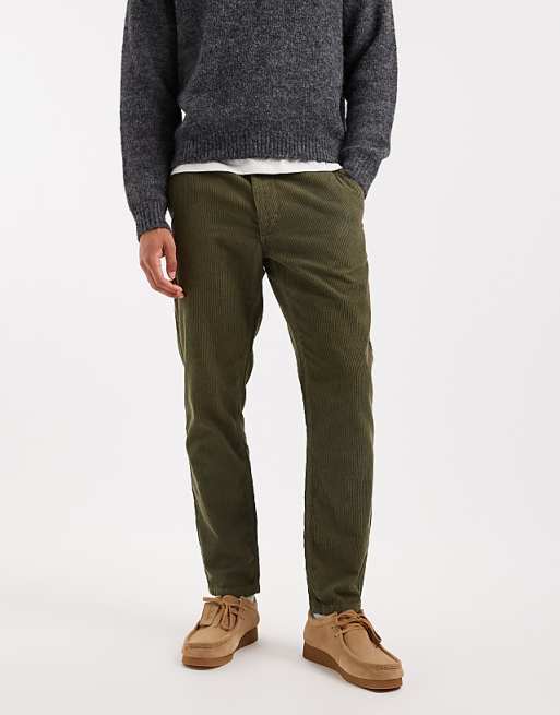 DESIGN tapered trousers in khaki corduroy