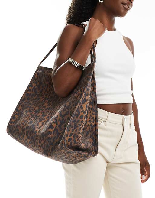 DESIGN tubular handle canvas tote bag in brown leopard