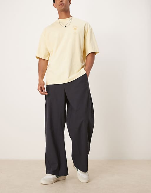 DESIGN twisted horseshoe trouser in black