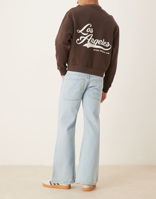 DESIGN Wide Flare Jeans In Bleached Blue