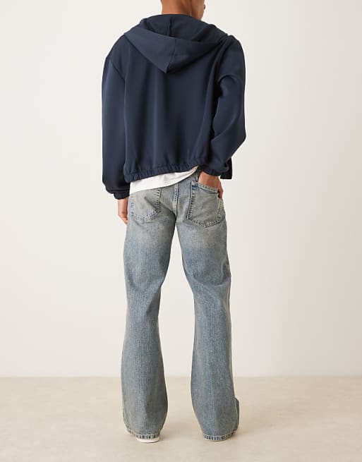 DESIGN Wide Flare Jeans In Light Wash Blue With Tint