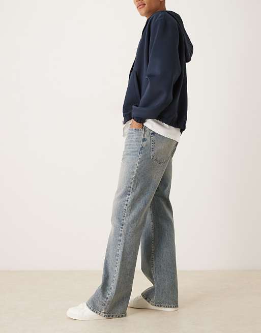 DESIGN Wide Flare Jeans In Light Wash Blue With Tint