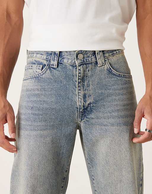 DESIGN Wide Flare Jeans In Light Wash Blue With Tint