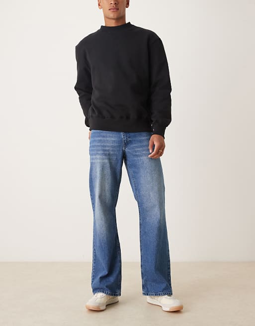 DESIGN Wide Flare Jeans In Mid Wash Blue