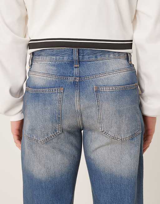 DESIGN Wide Flare Jeans In Tinted Wash