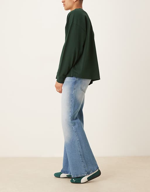 DESIGN Wide Flare Jeans In Vintage Wash