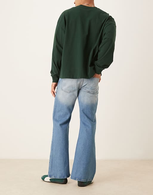 DESIGN Wide Flare Jeans In Vintage Wash