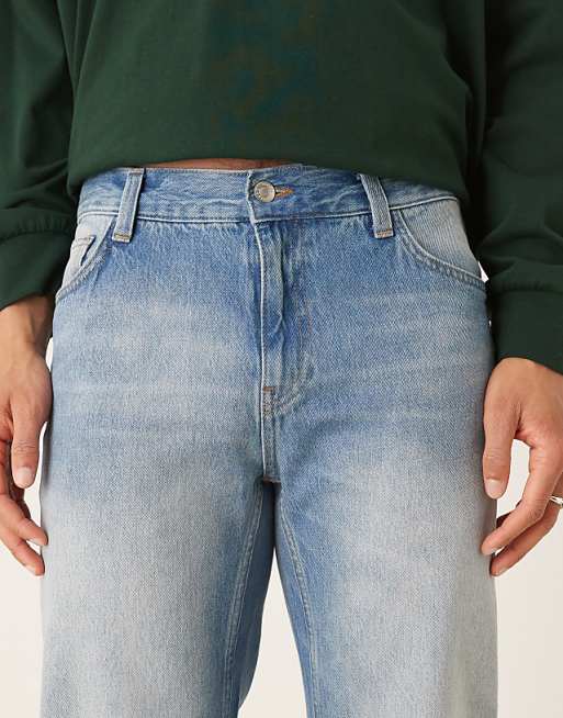 DESIGN Wide Flare Jeans In Vintage Wash
