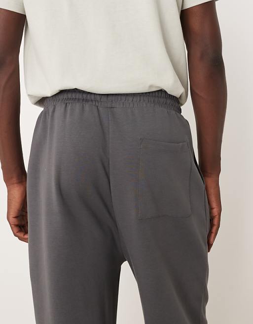 DESIGN Wide Leg Jogger With Pleats In Dark Grey