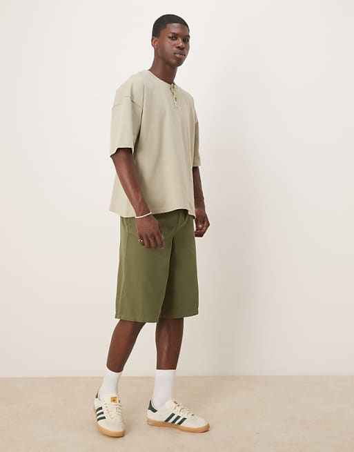 DESIGN wide longline herringbone shorts in green