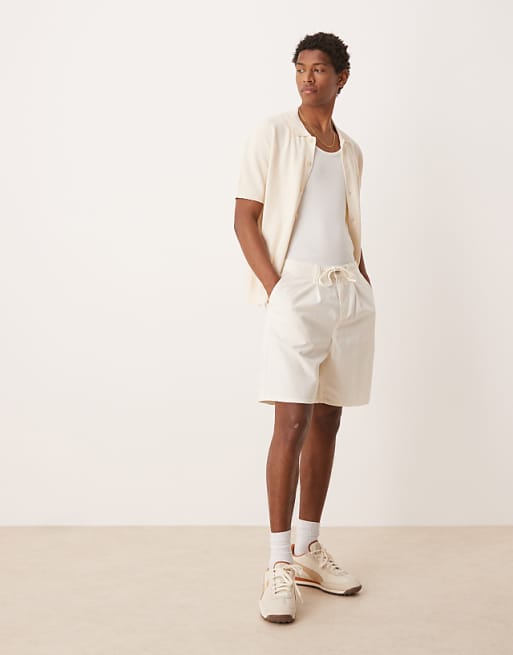 DESIGN wide mid length pleated shorts with drawstring in white