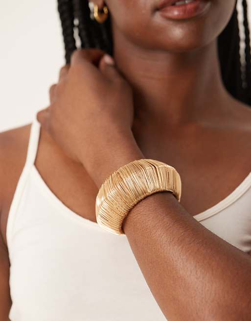 DESIGN wire wrapped cuff bracelet in gold tone