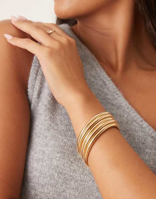DESIGN wrap-around stretchy bracelet in gold tone