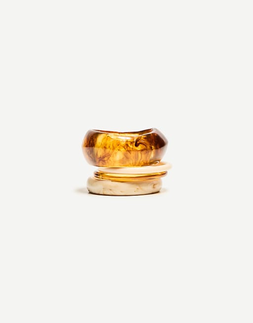 Bershka 4-pack of mother-of-pearl-effect bracelets in brown