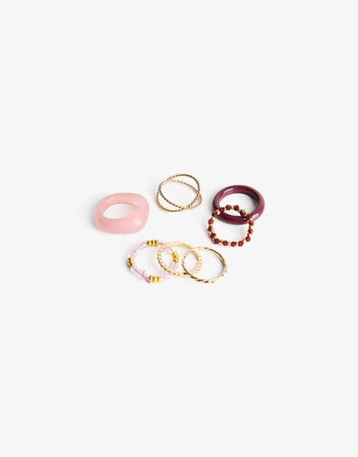 Bershka Pack of 8 rhinestone rings in gold