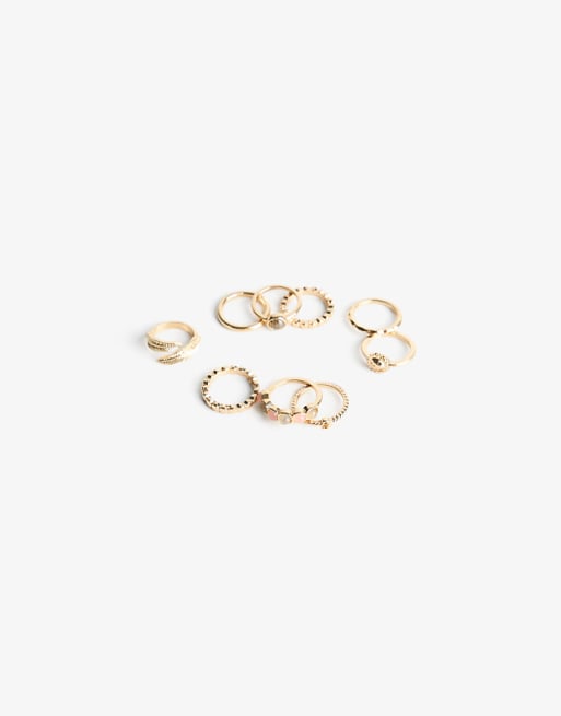 Bershka Pack of 9 rhinestone rings in gold