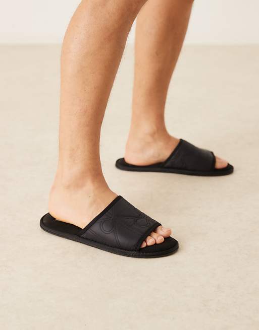 Calvin Klein logo mule slippers in black