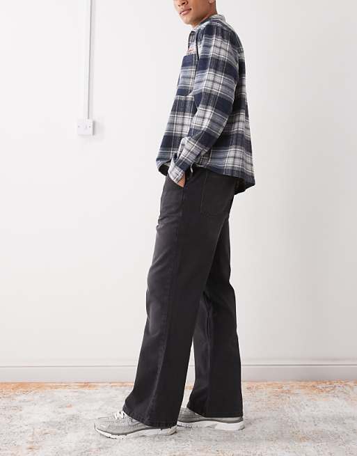 COLLUSION Flare Jean In Washed Black