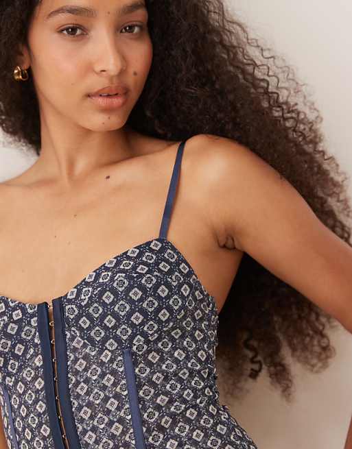 Free People Printed Rhythym Bodysuit In Navy Geo Print