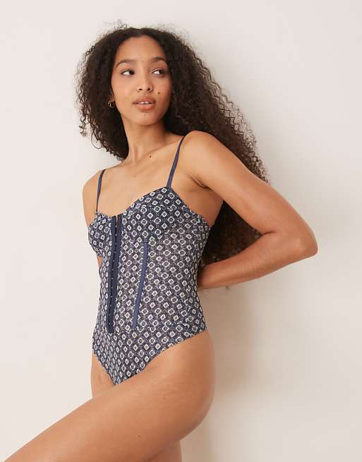Free People printed rhythym bodysuit in navy geo print