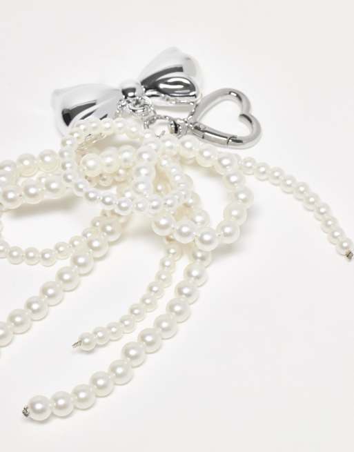 Kaiia Exclusive Heart Carabiner Pearl And Chrome Bow Bag Charm In Silver