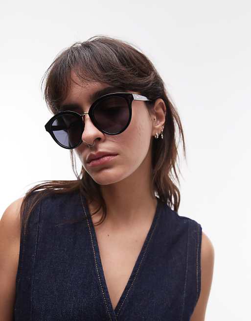 Le Specs influx round sunglasses with gold detail in black