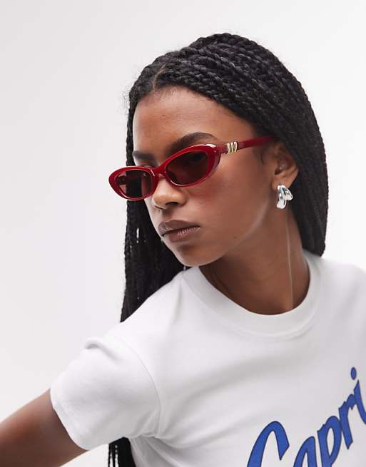 Le Specs the whisperer oval sunglasses in garnet red