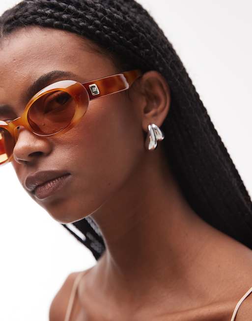 Le Specs work it oval sunglasses in bright tort