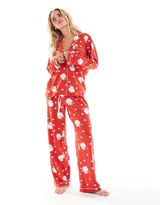 Loungeable Petite Christmas super soft jersey revere top and wide leg pyjama set in red santa print