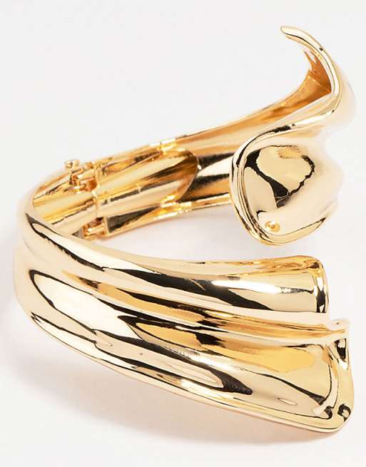 Lovisa Lovisa gold ribbed wave wrap wrist cuff in gold