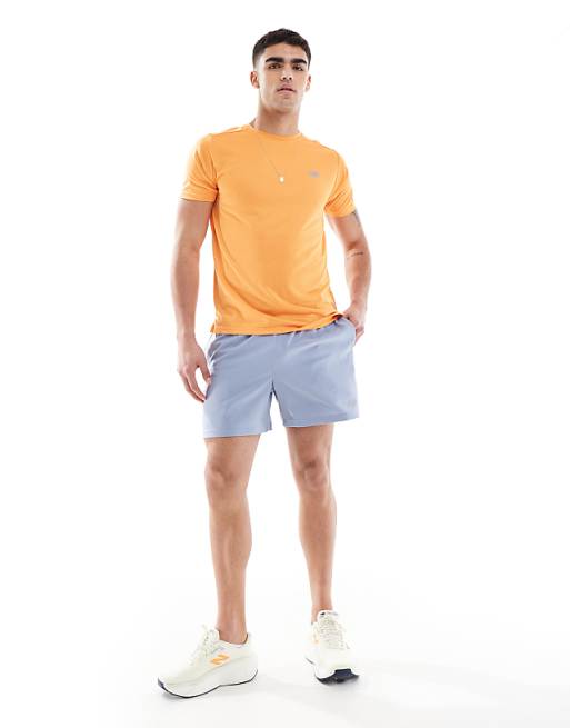 New Balance essentials 5 inch shorts in blue