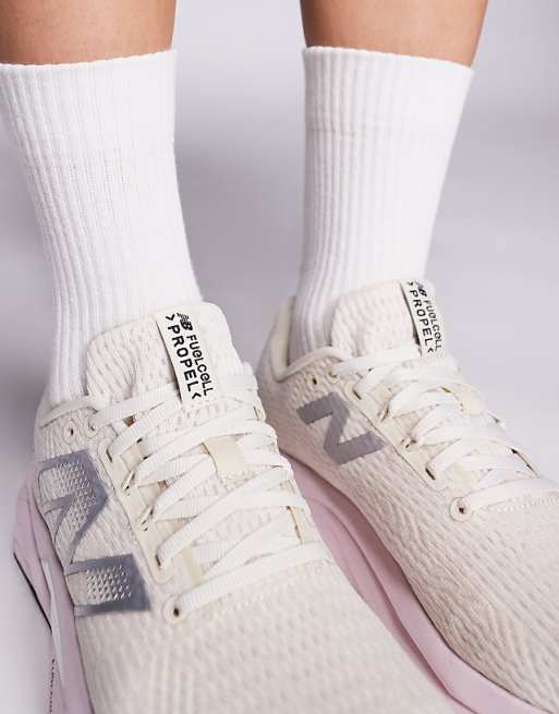 New Balance Propel Running Trainers In Beige And Pink