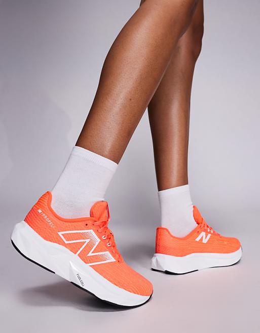 New Balance Propel Running Trainers In Bright Red