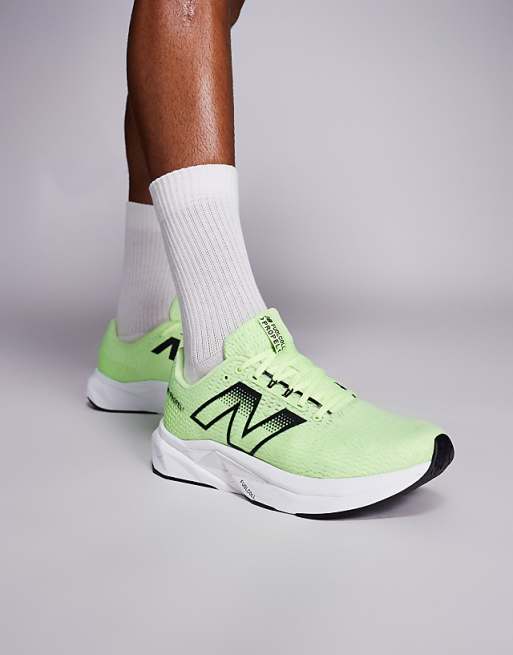 New Balance Propel running trainers in volt green