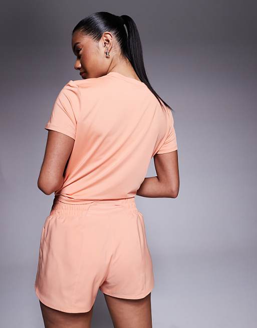 Nike One Training Dri-FIT Twisted Cropped T-shirt In Coral