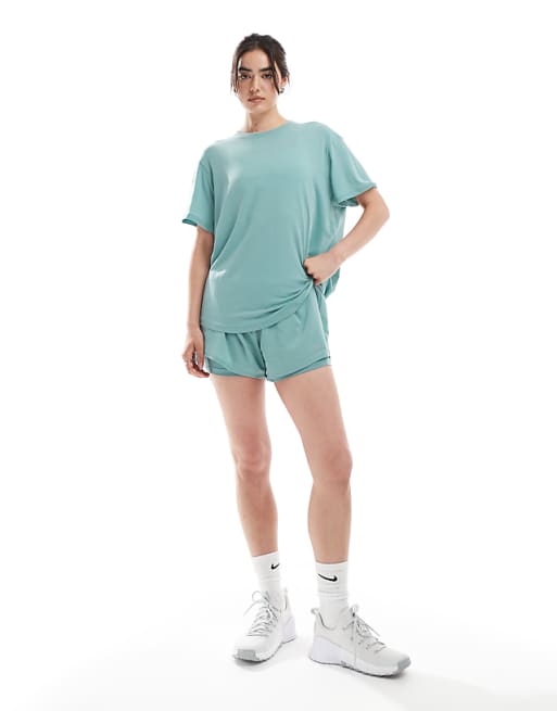 Nike One Training highwaisted 3 inch 2 in 1 shorts and relaxed t-shirt in light blue