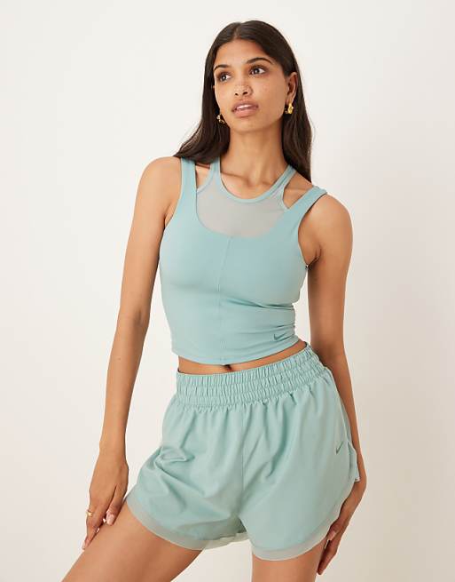 Nike One Training Relaxed Wrap Longsleeve Top Layered Vest And High Waisted 3 Inch Frilly Shorts In Light Blue