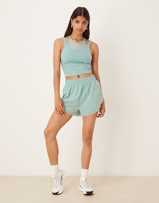 Nike One Training Relaxed Wrap Longsleeve Top Layered Vest And High Waisted 3 Inch Frilly Shorts In Light Blue