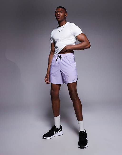 Nike Running Stride Dri-FIT 7 inch shorts in lilac