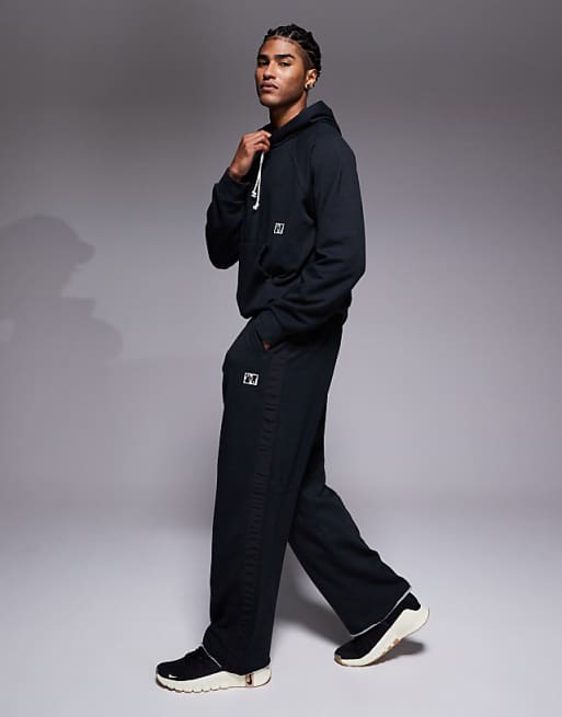 Nike Training Heritage Dri-FIT Joggers In Black