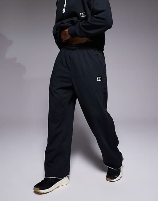 Nike Training Heritage Dri-FIT joggers in black
