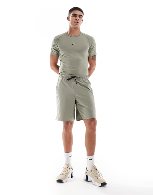 Nike Training Unlimited Dri-FIT Woven 9inch Shorts In Light Green